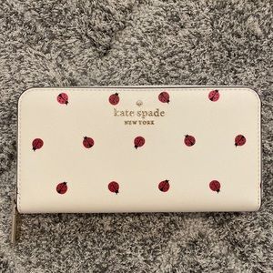 Kate Spade White with Red Ladybug Wallet. Full sized